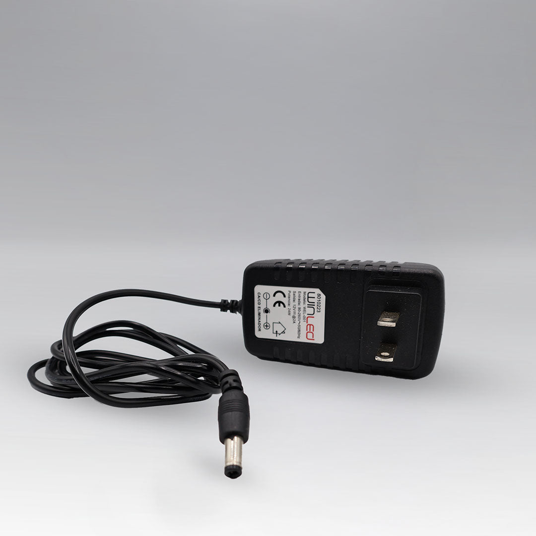 WEL-001 ELIMINADOR DE VOLTAJE CD 12V A 2AMP INTERIOR